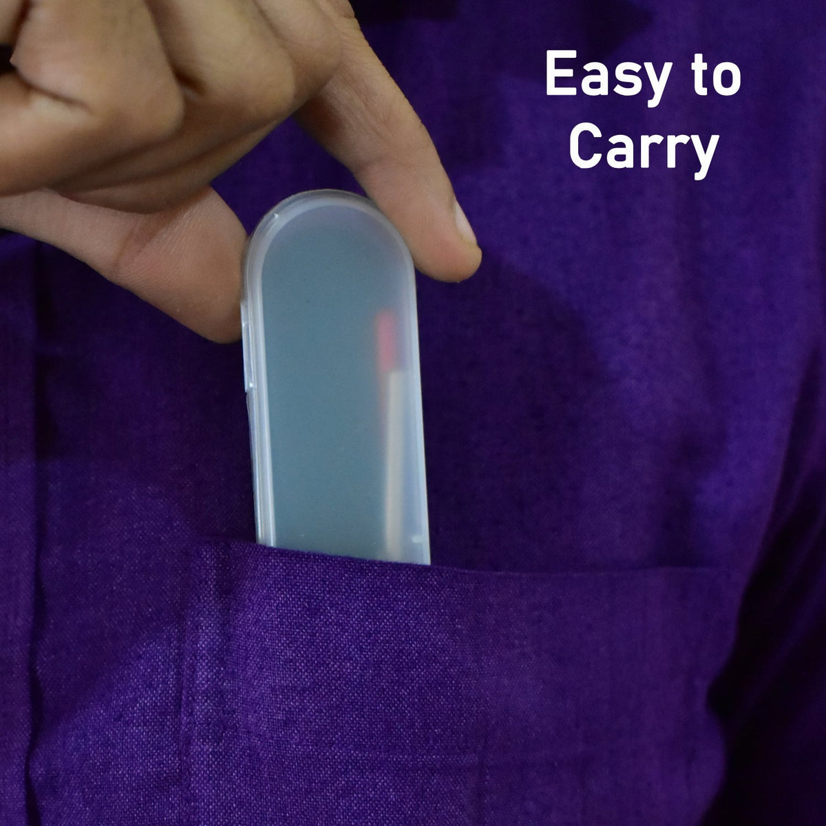 A hand places the clear case containing the ear cleaning tools into a purple shirt pocket.