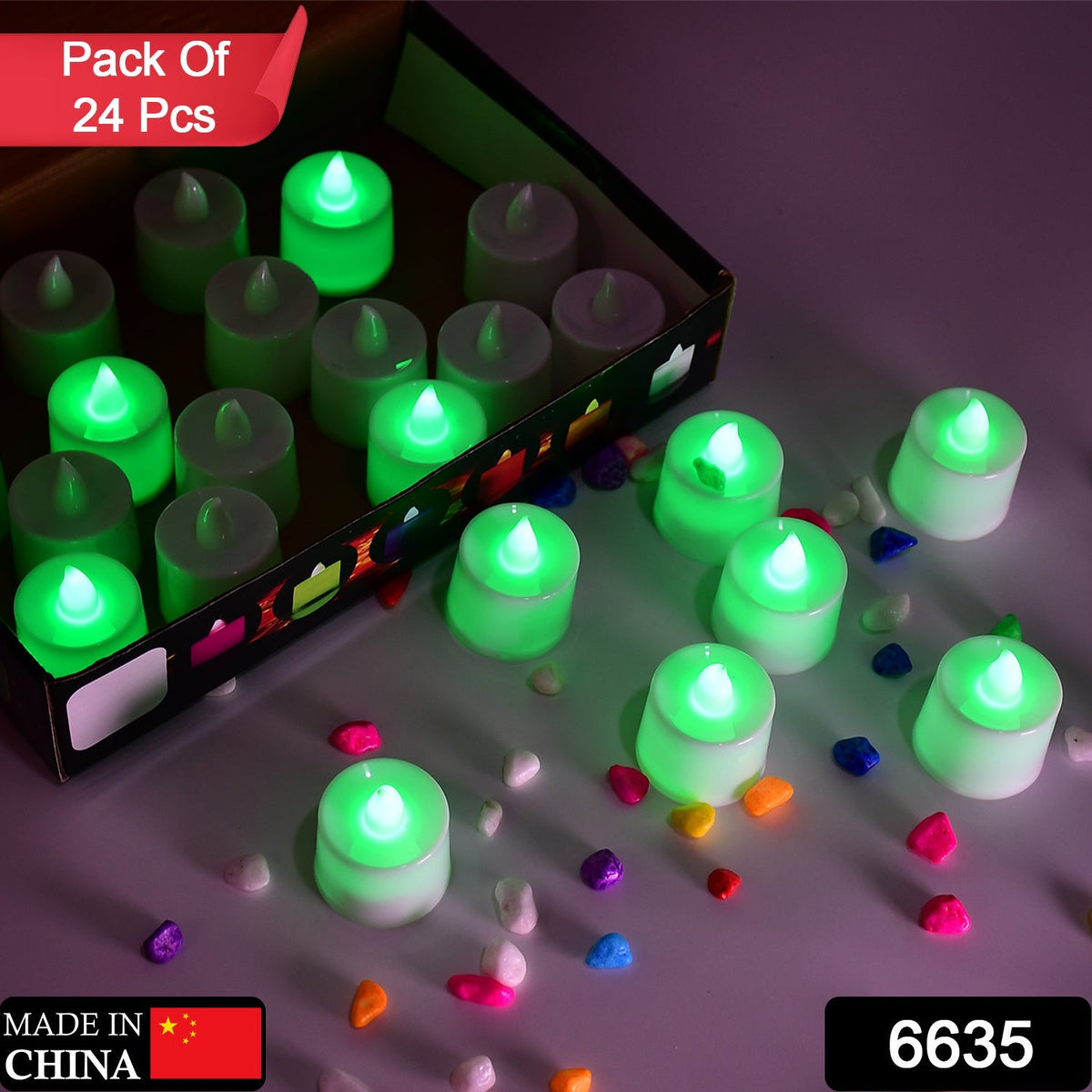 A brown cardboard box holds twenty-four green flameless LED tealights, with several more scattered around on a light surface.