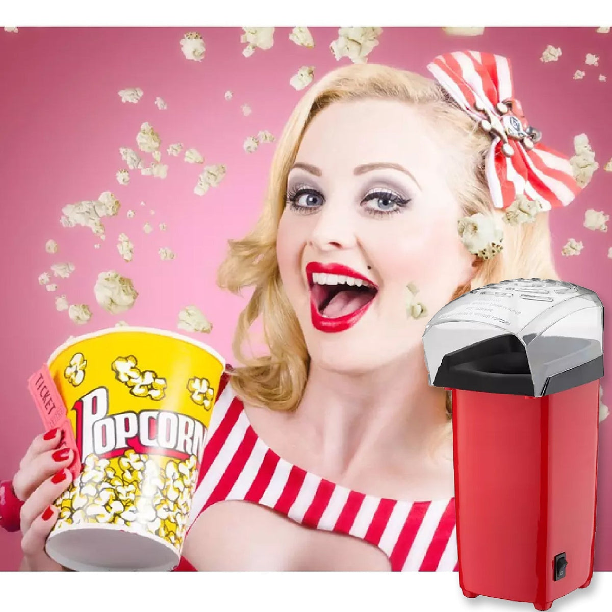 Woman in a striped top holding a popcorn cup, with popcorn flying around and the red popcorn maker beside her.