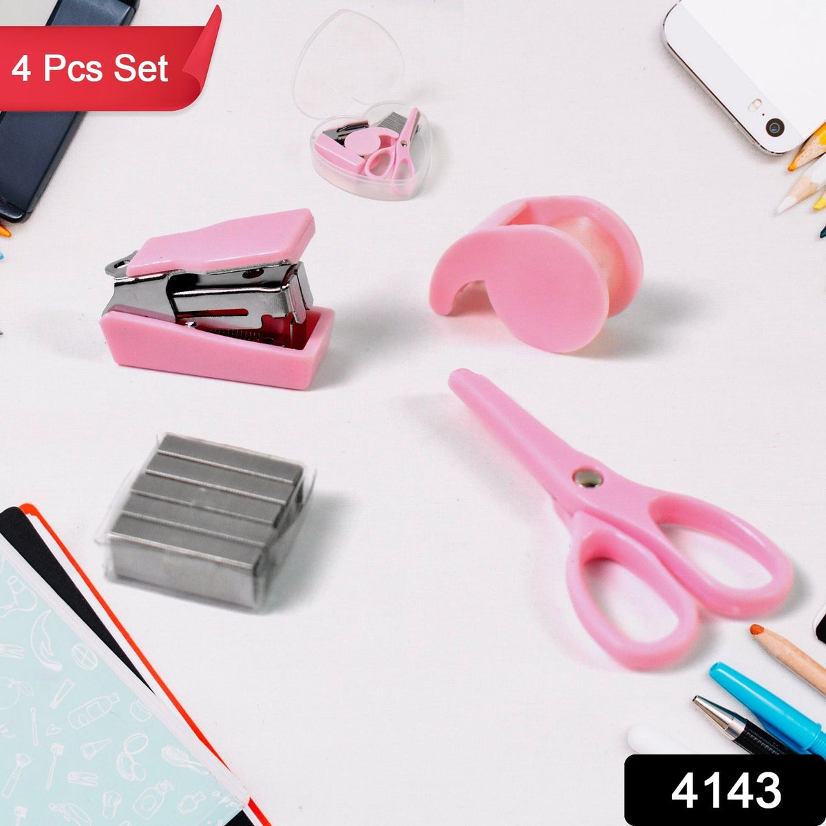 A pink mini stapler, tape dispenser, scissors, and a box of staples on a white surface, with a "4 Pcs Set" banner.