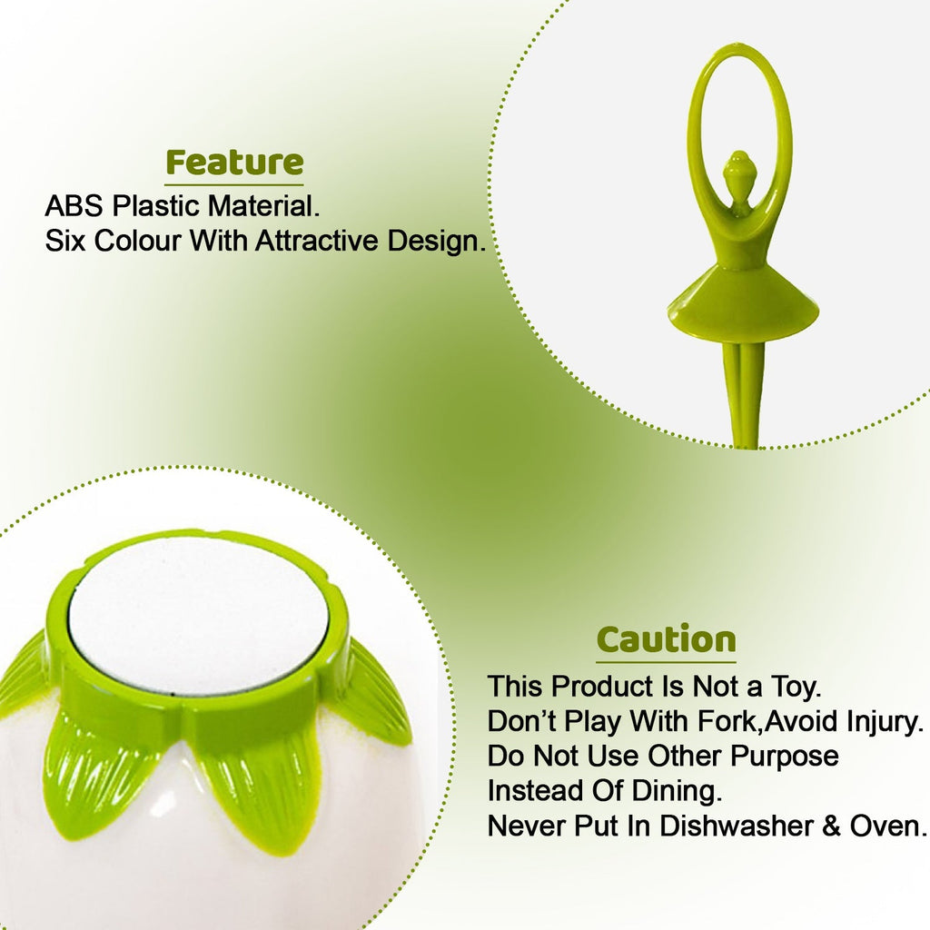 A close-up of a green dancing doll fruit fork and the base of the white flower-shaped stand with green accents.