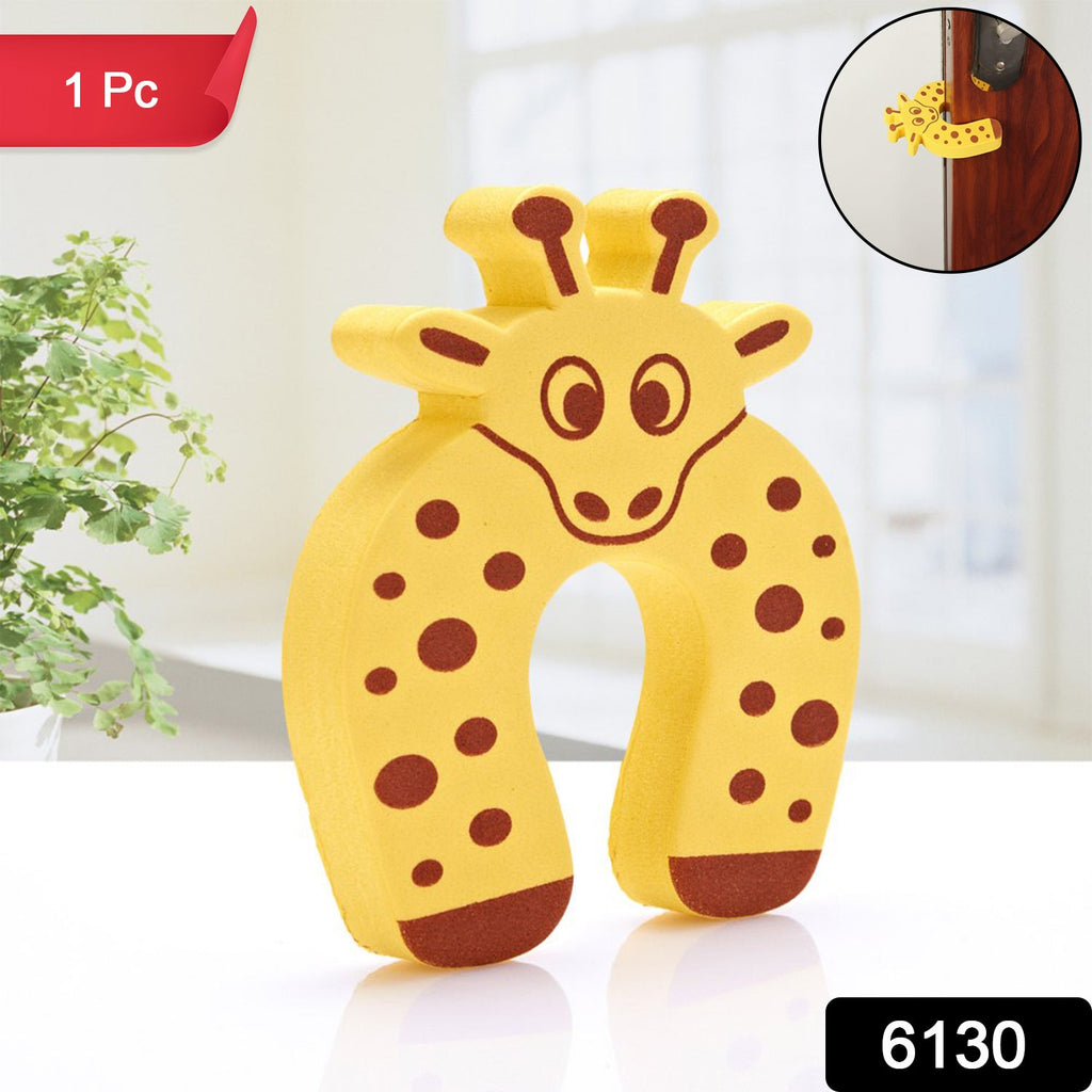A yellow giraffe-shaped EVA door stopper with brown spots stands upright on a white surface.